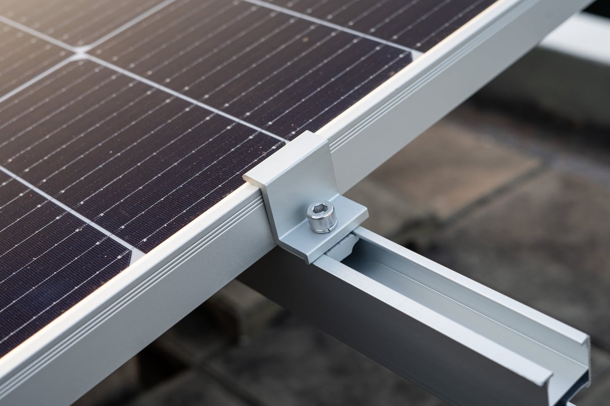 IronRidge clamp at the edge of a solar panel mounting system